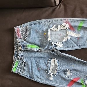 Studded hand-painted ripped jeans